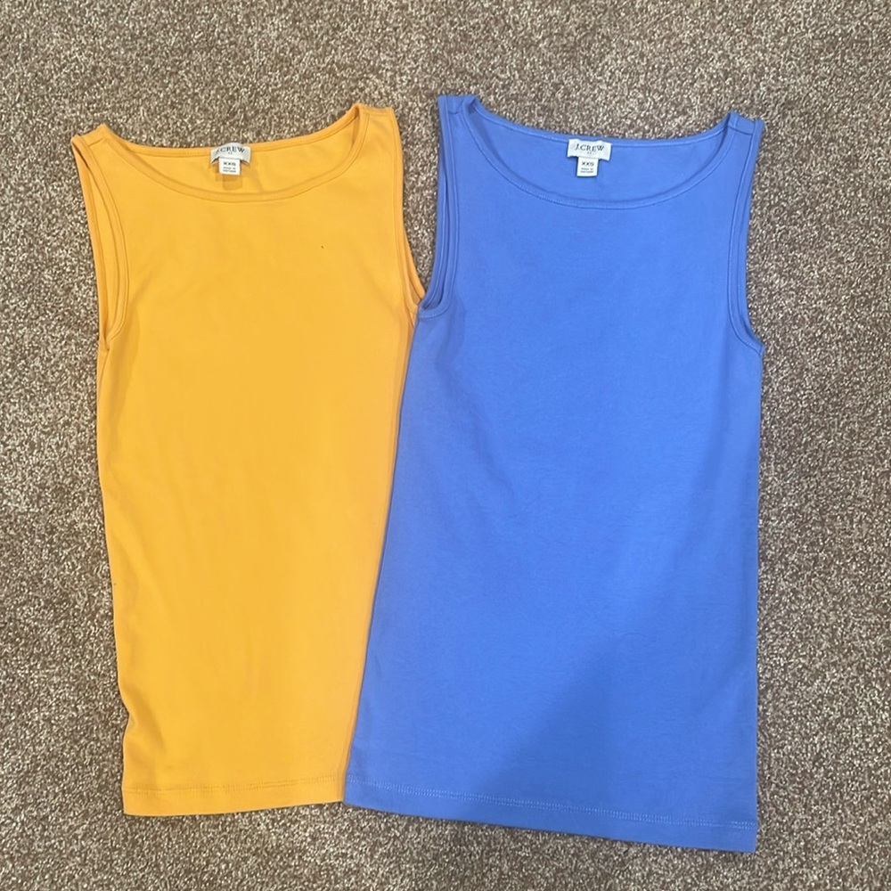Two JCrew sleeveless shirts.